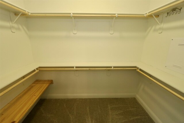 full bathroom featuring a bath, a stall shower, tile patterned flooring, and a sink