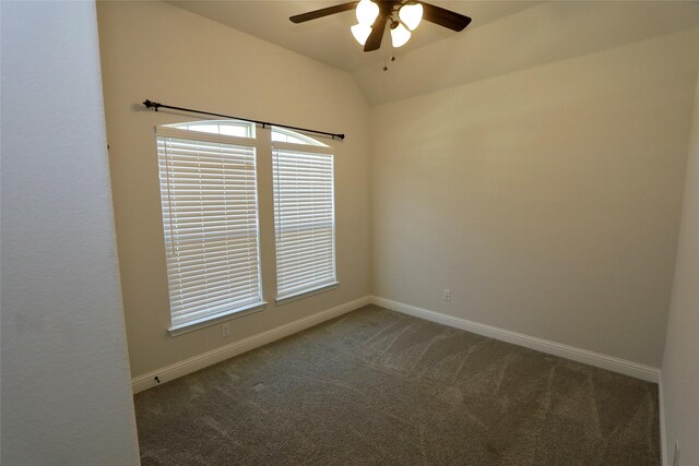 walk in closet with dark carpet