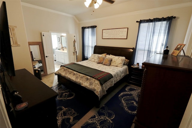 bedroom with ceiling fan, ornamental molding, ensuite bath, and vaulted ceiling