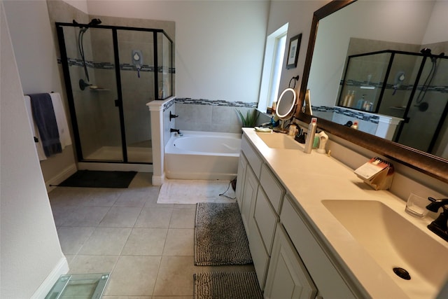 bathroom with separate shower and tub, vanity, and tile patterned floors