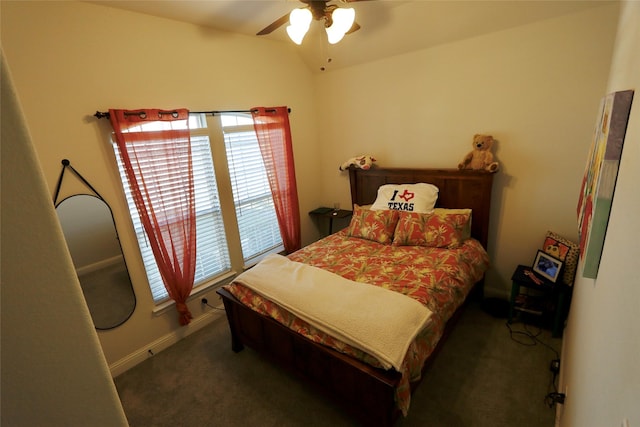 carpeted bedroom featuring ceiling fan and vaulted ceiling