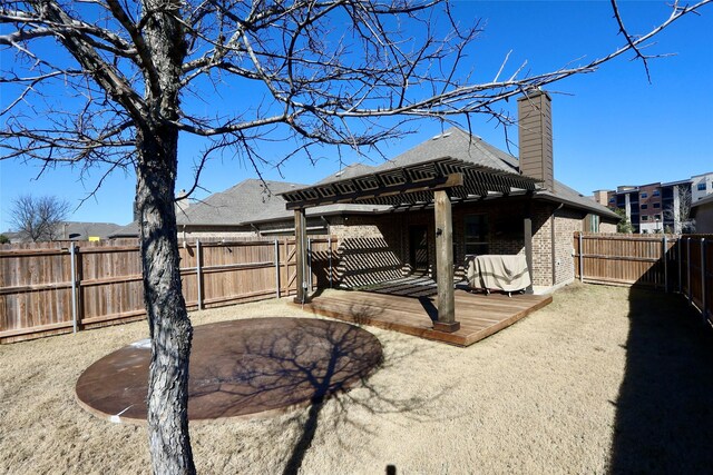 view of yard with a fenced backyard, a pergola, and a patio