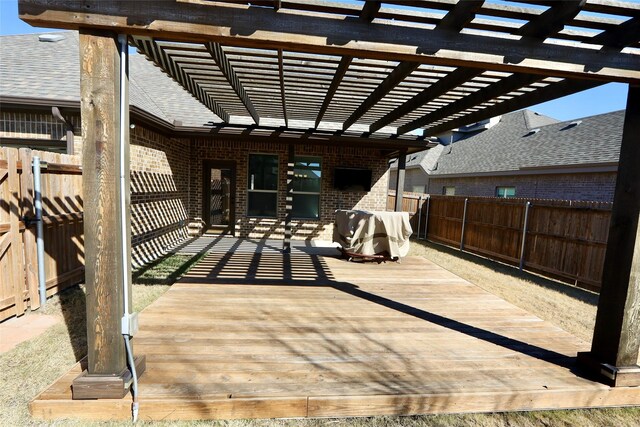 view of yard featuring a patio area, a fenced backyard, a deck, and a pergola