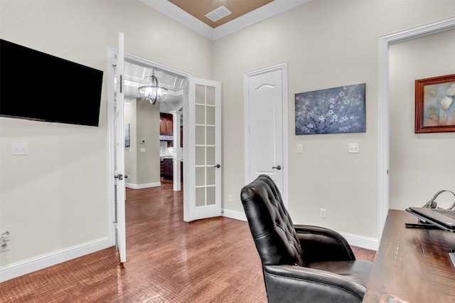 office space featuring wood-type flooring, crown molding, and french doors