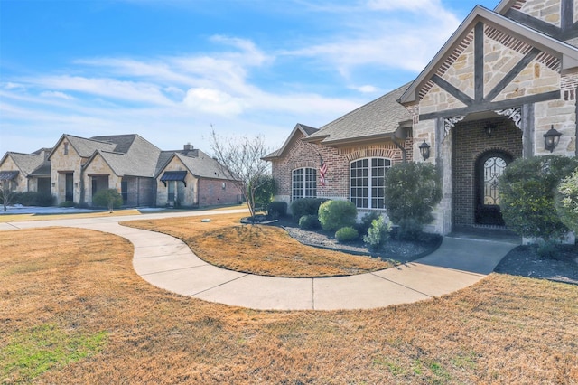 view of front of home with a front yard