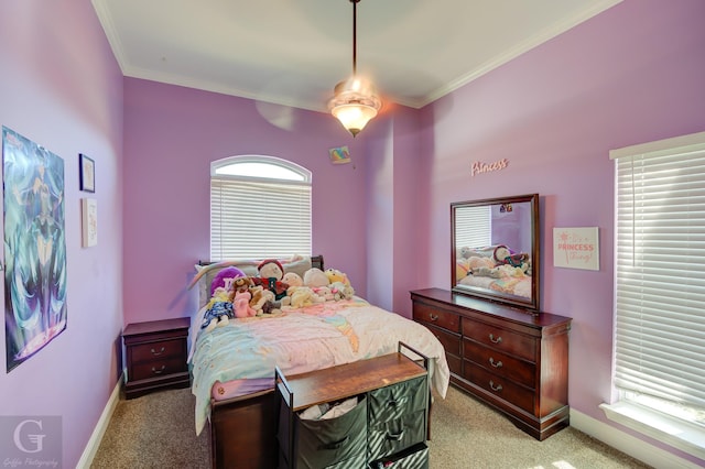 carpeted bedroom featuring ceiling fan, ornamental molding, and multiple windows