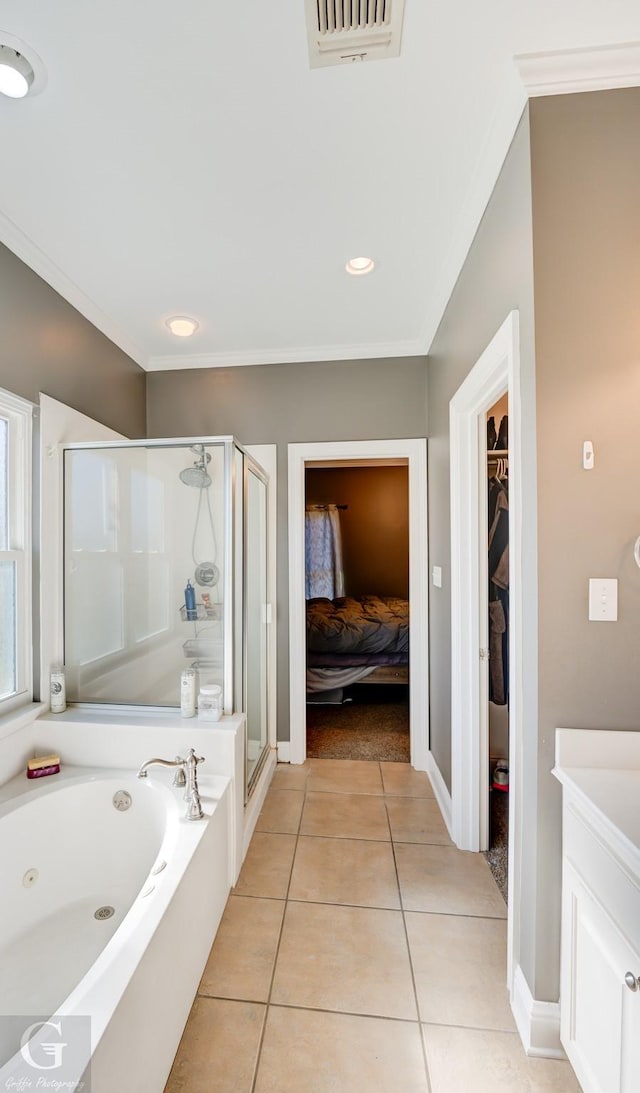 bathroom with ornamental molding, tile patterned floors, and shower with separate bathtub