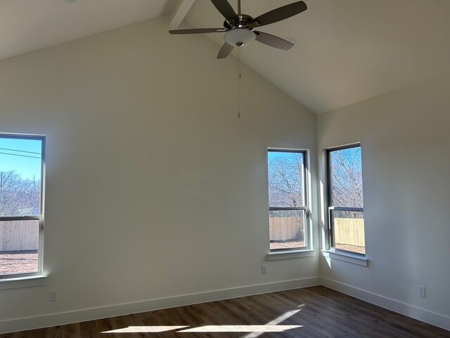 spare room with ceiling fan, lofted ceiling with beams, and dark hardwood / wood-style flooring