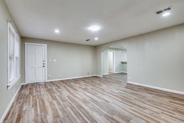 empty room with light wood-type flooring