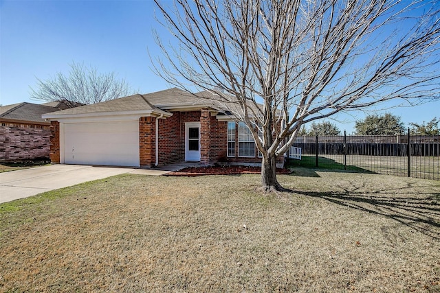 single story home featuring a garage and a front yard