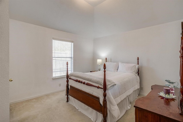 bedroom featuring light carpet