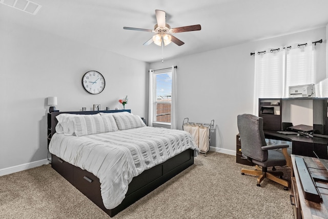 bedroom with ceiling fan and carpet