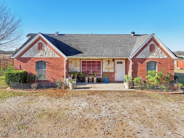 ranch-style home with a patio