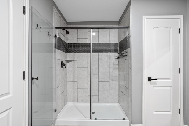 bathroom featuring an enclosed shower