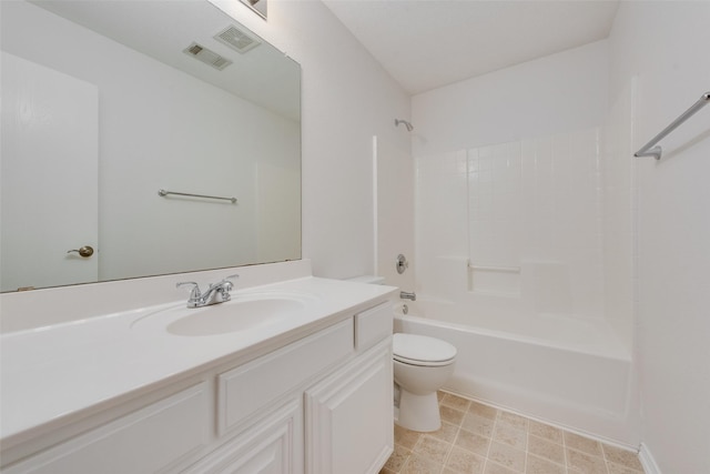 full bathroom with toilet, vanity, and  shower combination