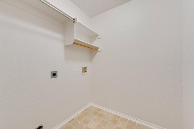 laundry area with washer hookup, a textured ceiling, and hookup for an electric dryer