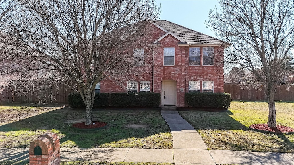 view of front of house with a front lawn