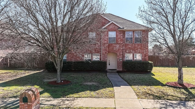 view of front of house with a front lawn