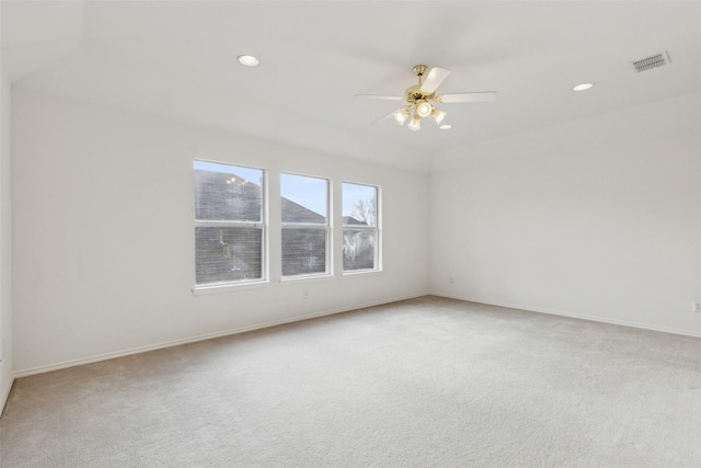 empty room with light carpet and ceiling fan