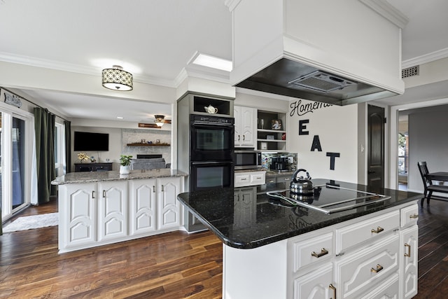 kitchen featuring dark wood-style floors, custom range hood, crown molding, black appliances, and open shelves