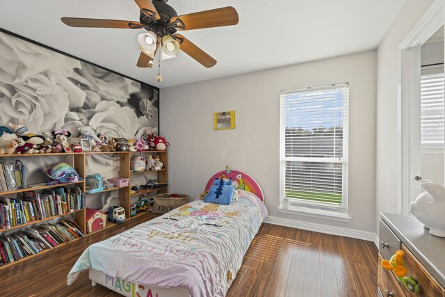 office space with hardwood / wood-style floors and ceiling fan