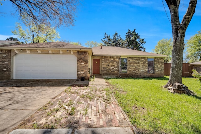 ranch-style home with a front lawn and a garage