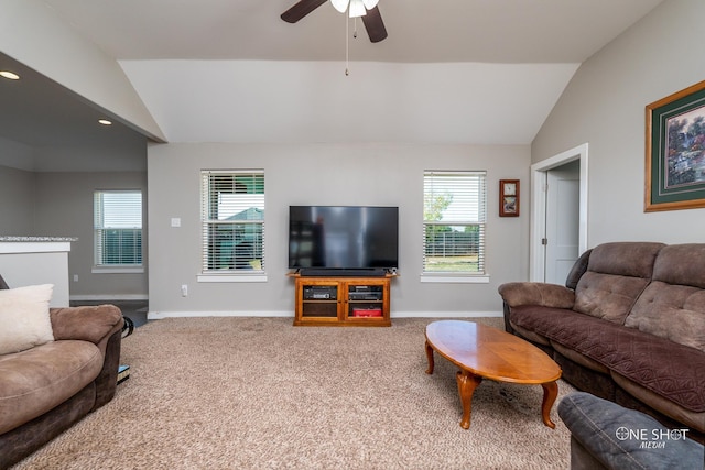 living room featuring ceiling fan, carpet, and lofted ceiling