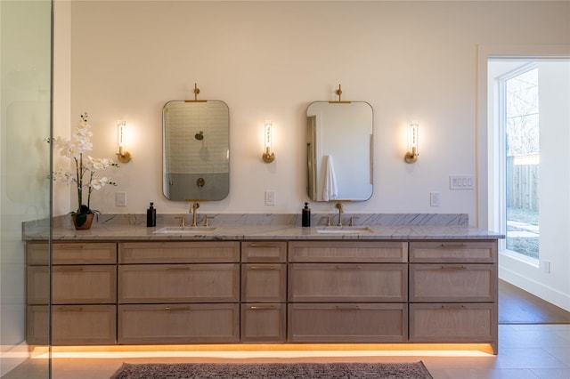 bathroom featuring vanity and a wealth of natural light