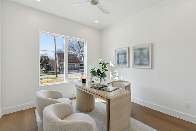 office area with hardwood / wood-style floors and ceiling fan