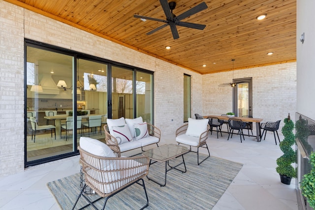 view of patio featuring outdoor lounge area and ceiling fan