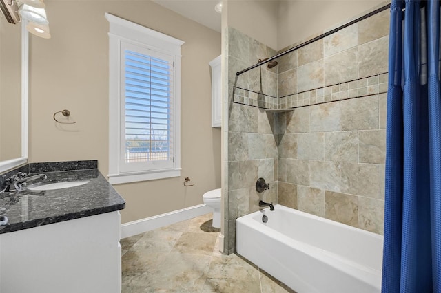 full bathroom featuring toilet, vanity, and shower / tub combo with curtain