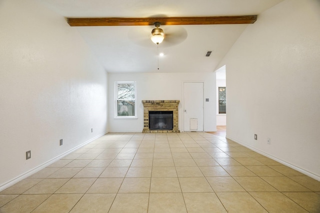 unfurnished living room featuring ceiling fan, light tile patterned flooring, a brick fireplace, and vaulted ceiling with beams