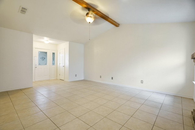 unfurnished room featuring ceiling fan, lofted ceiling with beams, and light tile patterned flooring