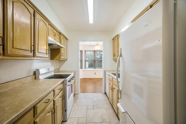 kitchen with ceiling fan and white appliances