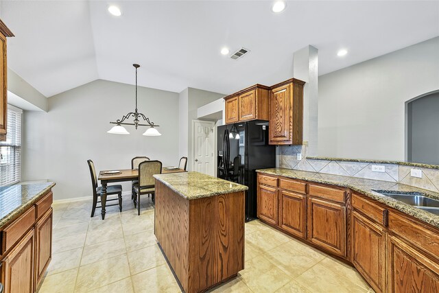 dining room with a notable chandelier and light hardwood / wood-style floors