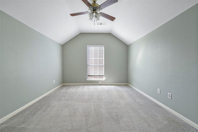 bonus room featuring visible vents, baseboards, carpet flooring, lofted ceiling, and ceiling fan