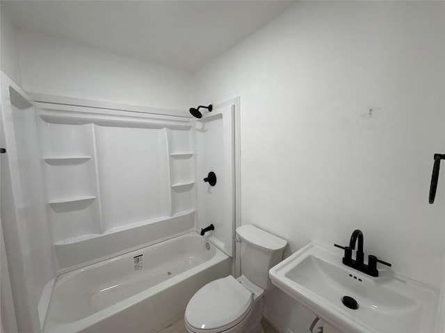 full bathroom featuring toilet, bathtub / shower combination, and sink