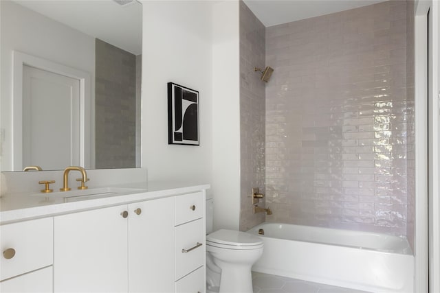 full bathroom with toilet, vanity, tile patterned flooring, and shower / washtub combination