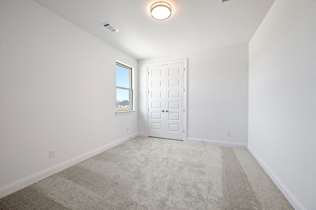 unfurnished bedroom featuring carpet floors