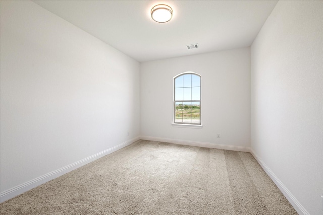 spare room with carpet