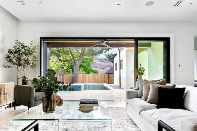 living room featuring ceiling fan