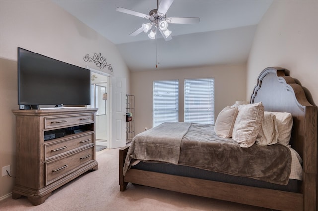 bedroom featuring ceiling fan, light carpet, and lofted ceiling