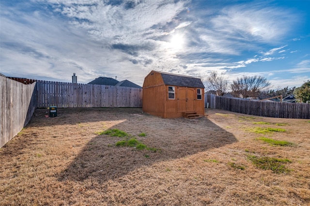 view of yard with a storage shed