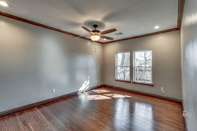 unfurnished room with ceiling fan, hardwood / wood-style floors, and crown molding