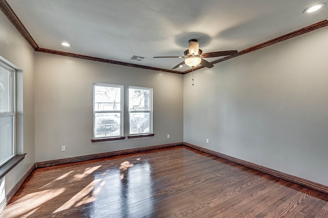 unfurnished room with ceiling fan, wood-type flooring, and ornamental molding