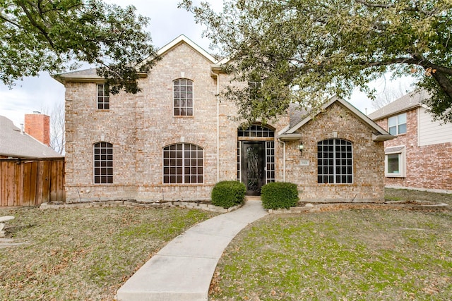 view of front of home with a front lawn