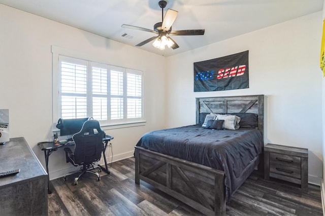 bedroom featuring ceiling fan and dark hardwood / wood-style floors