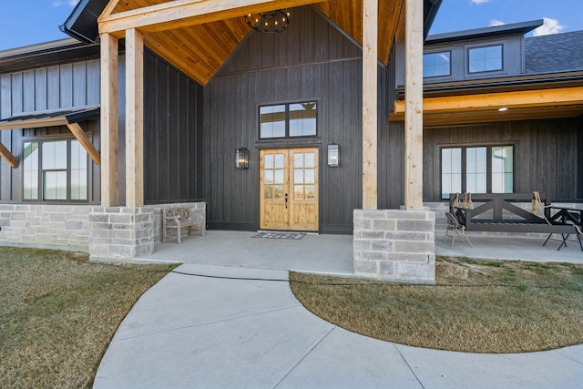 property entrance featuring french doors