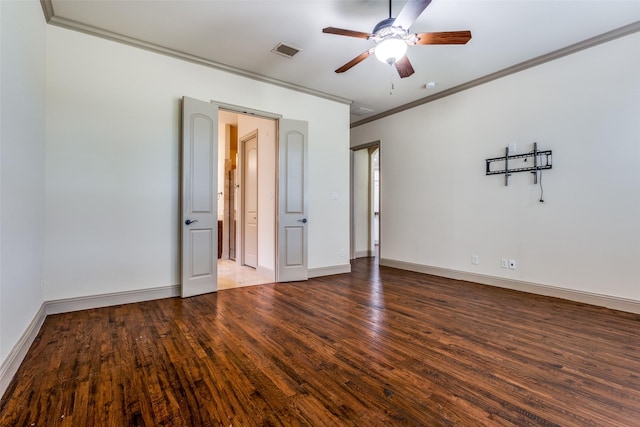 spare room featuring ceiling fan, crown molding, and hardwood / wood-style flooring