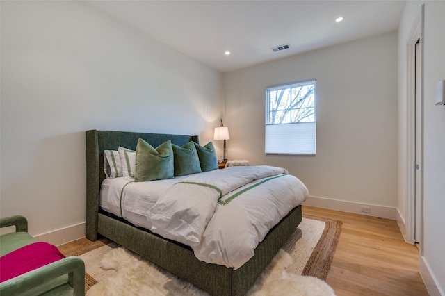 bedroom featuring light wood-type flooring